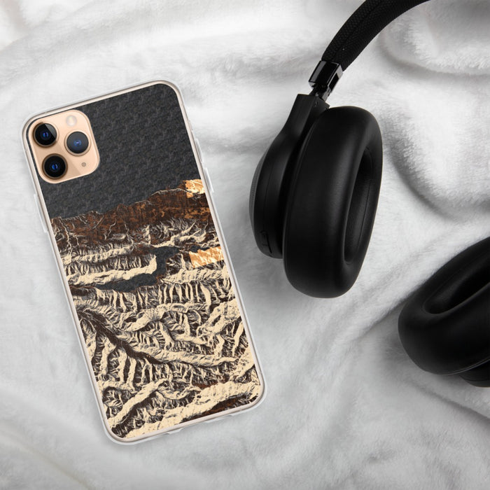 Custom Lake Crescent Washington Map Phone Case in Ember on Table with Black Headphones