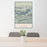 24x36 Lake Crescent Washington Map Print Portrait Orientation in Woodblock Style Behind 2 Chairs Table and Potted Plant