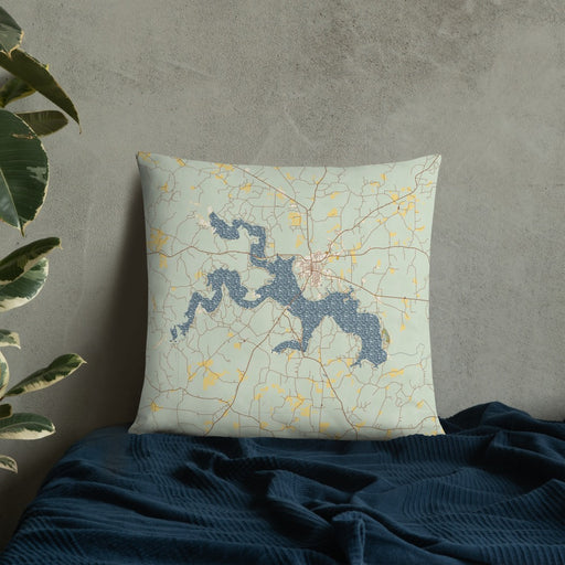 Custom Lake D'Arbonne Louisiana Map Throw Pillow in Woodblock on Bedding Against Wall