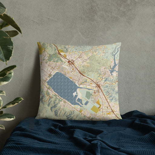Custom Lake Elsinore California Map Throw Pillow in Woodblock on Bedding Against Wall