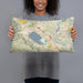 Person holding 20x12 Custom Lake Elsinore California Map Throw Pillow in Woodblock