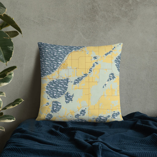 Custom Lake Ethel Minnesota Map Throw Pillow in Woodblock on Bedding Against Wall