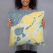 Person holding 18x18 Custom Lake Ethel Minnesota Map Throw Pillow in Woodblock