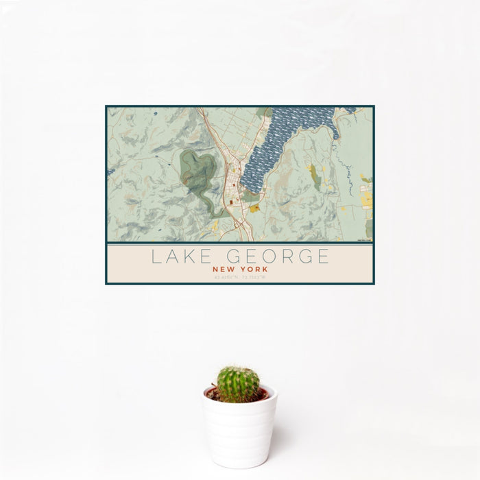 12x18 Lake George New York Map Print Landscape Orientation in Woodblock Style With Small Cactus Plant in White Planter
