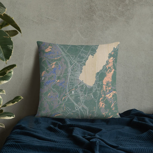 Custom Lake George New York Map Throw Pillow in Afternoon on Bedding Against Wall