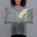 Person holding 20x12 Custom Lake George New York Map Throw Pillow in Afternoon