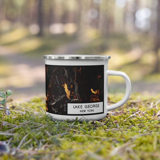 Right View Custom Lake George New York Map Enamel Mug in Ember on Grass With Trees in Background