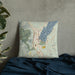 Custom Lake George New York Map Throw Pillow in Woodblock on Bedding Against Wall