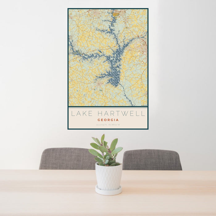 24x36 Lake Hartwell Georgia Map Print Portrait Orientation in Woodblock Style Behind 2 Chairs Table and Potted Plant