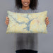 Person holding 20x12 Custom Lake Hartwell Georgia Map Throw Pillow in Woodblock