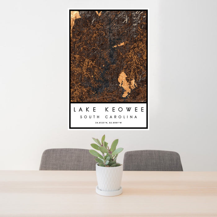 24x36 Lake Keowee South Carolina Map Print Portrait Orientation in Ember Style Behind 2 Chairs Table and Potted Plant