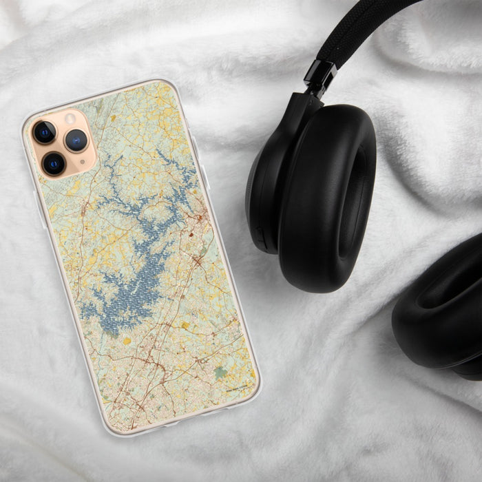 Custom Lake Lanier Georgia Map Phone Case in Woodblock on Table with Black Headphones