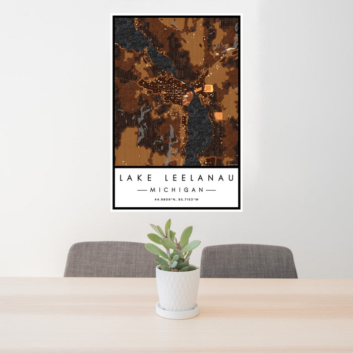 24x36 Lake Leelanau Michigan Map Print Portrait Orientation in Ember Style Behind 2 Chairs Table and Potted Plant