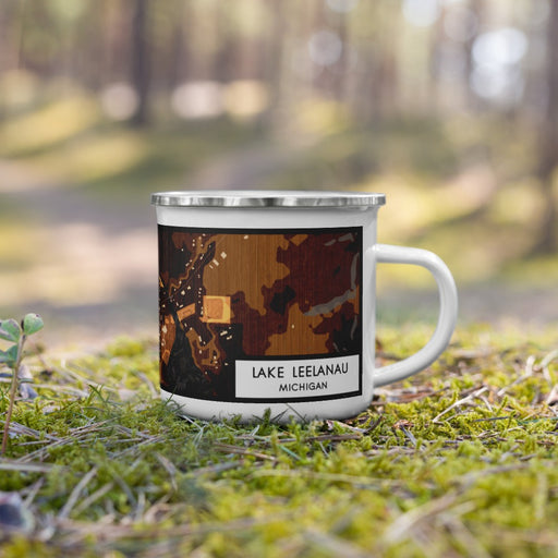 Right View Custom Lake Leelanau Michigan Map Enamel Mug in Ember on Grass With Trees in Background