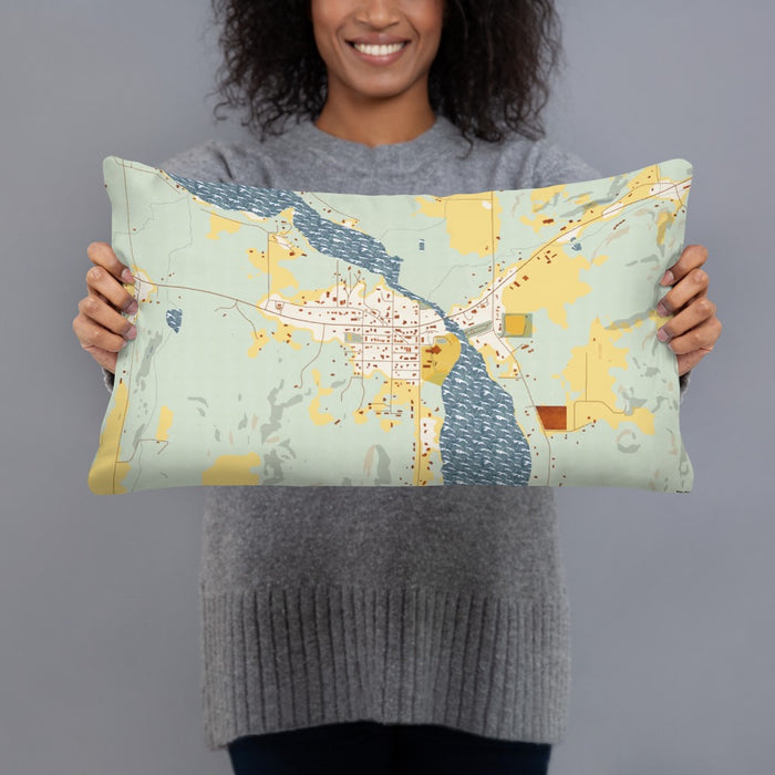 Person holding 20x12 Custom Lake Leelanau Michigan Map Throw Pillow in Woodblock