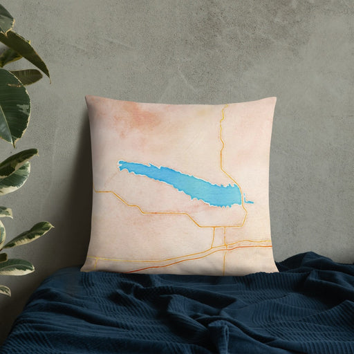 Custom Lake McConaughy Nebraska Map Throw Pillow in Watercolor on Bedding Against Wall
