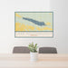 24x36 Lake McConaughy Nebraska Map Print Landscape Orientation in Woodblock Style Behind 2 Chairs Table and Potted Plant