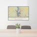 24x36 Lake Norman North Carolina Map Print Lanscape Orientation in Woodblock Style Behind 2 Chairs Table and Potted Plant