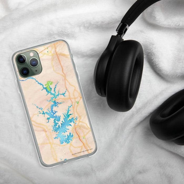 Custom Lake Norman North Carolina Map Phone Case in Watercolor on Table with Black Headphones
