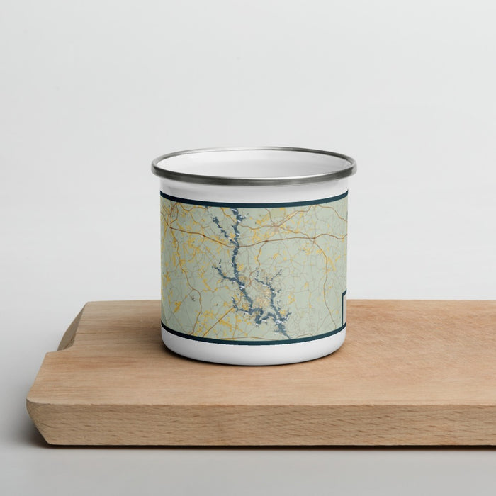 Front View Custom Lake Oconee Georgia Map Enamel Mug in Woodblock on Cutting Board