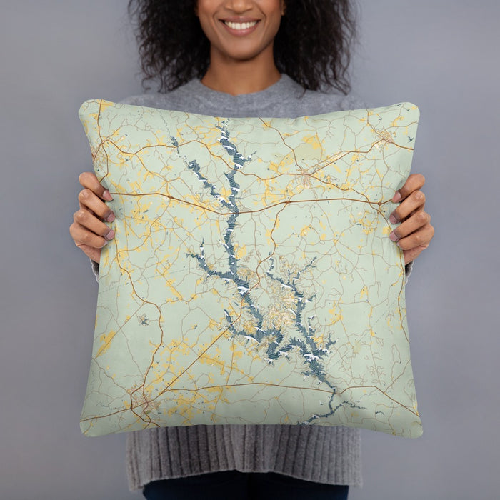 Person holding 18x18 Custom Lake Oconee Georgia Map Throw Pillow in Woodblock