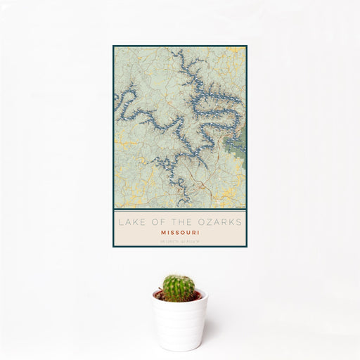 12x18 Lake of the Ozarks Missouri Map Print Portrait Orientation in Woodblock Style With Small Cactus Plant in White Planter