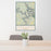 24x36 Lake of the Ozarks Missouri Map Print Portrait Orientation in Woodblock Style Behind 2 Chairs Table and Potted Plant