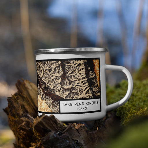 Right View Custom Lake Pend Oreille Idaho Map Enamel Mug in Ember on Grass With Trees in Background