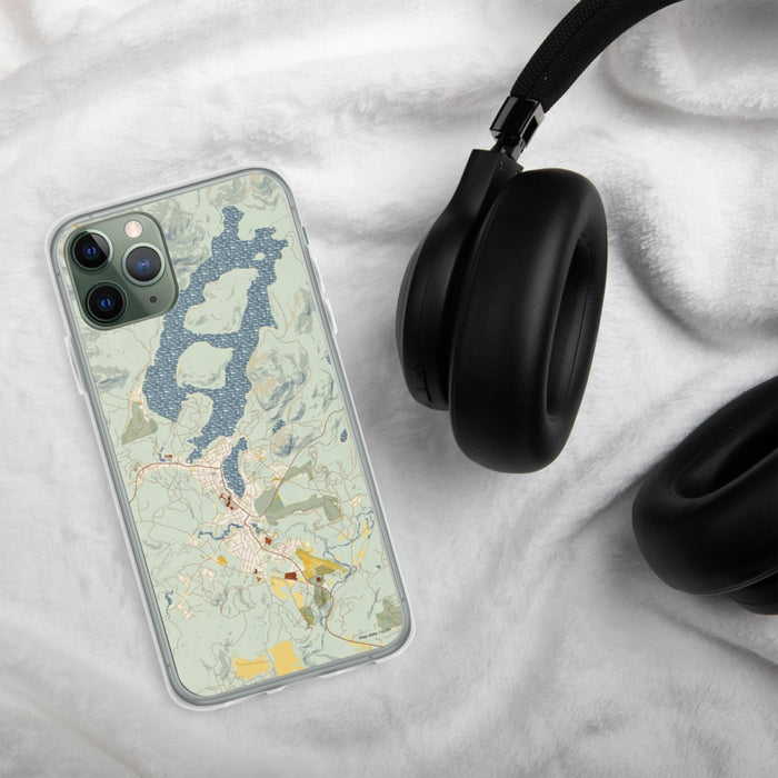 Custom Lake Placid New York Map Phone Case in Woodblock on Table with Black Headphones