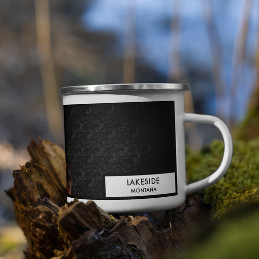 Right View Custom Lakeside Montana Map Enamel Mug in Ember on Grass With Trees in Background