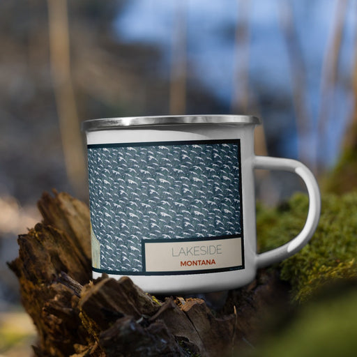 Right View Custom Lakeside Montana Map Enamel Mug in Woodblock on Grass With Trees in Background