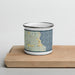 Front View Custom Lakeside Montana Map Enamel Mug in Woodblock on Cutting Board