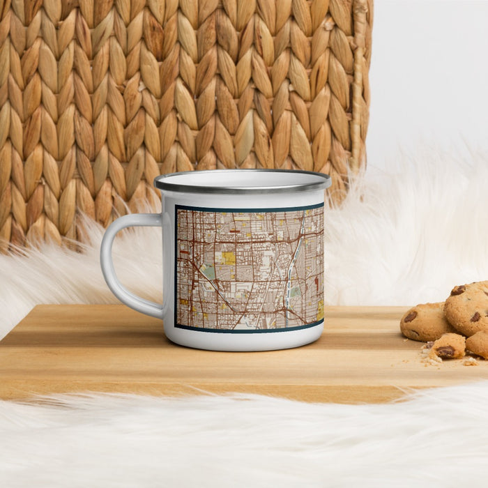 Left View Custom Lakewood California Map Enamel Mug in Woodblock on Table Top
