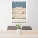 24x36 Lakewood Ohio Map Print Portrait Orientation in Woodblock Style Behind 2 Chairs Table and Potted Plant