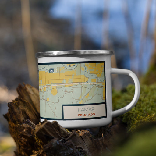 Right View Custom Lamar Colorado Map Enamel Mug in Woodblock on Grass With Trees in Background