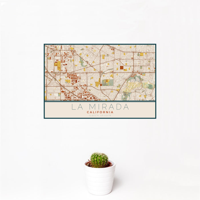 12x18 La Mirada California Map Print Landscape Orientation in Woodblock Style With Small Cactus Plant in White Planter