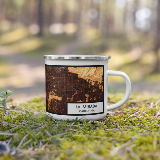 Right View Custom La Mirada California Map Enamel Mug in Ember on Grass With Trees in Background