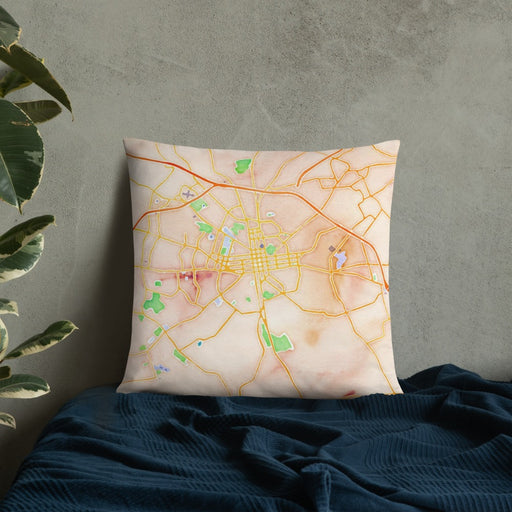 Custom Lancaster Pennsylvania Map Throw Pillow in Watercolor on Bedding Against Wall