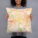 Person holding 18x18 Custom Lancaster Pennsylvania Map Throw Pillow in Watercolor