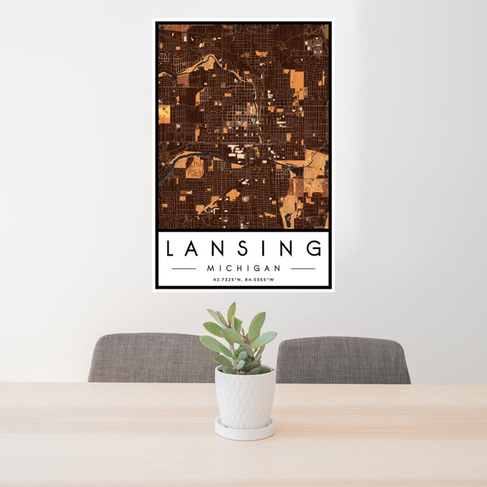 24x36 Lansing Michigan Map Print Portrait Orientation in Ember Style Behind 2 Chairs Table and Potted Plant