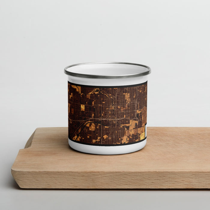 Front View Custom Lansing Michigan Map Enamel Mug in Ember on Cutting Board