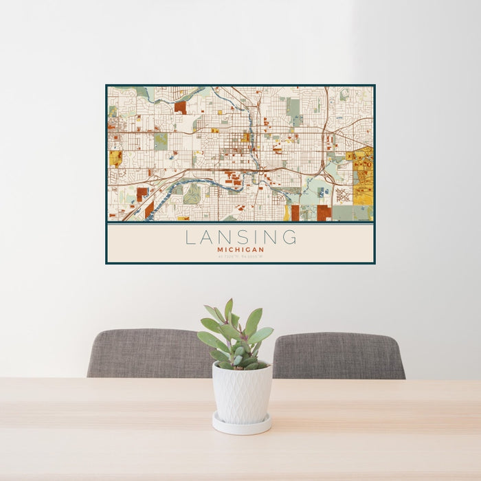 24x36 Lansing Michigan Map Print Landscape Orientation in Woodblock Style Behind 2 Chairs Table and Potted Plant