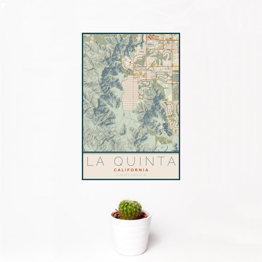 12x18 La Quinta California Map Print Portrait Orientation in Woodblock Style With Small Cactus Plant in White Planter