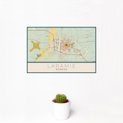 12x18 Laramie Wyoming Map Print Landscape Orientation in Woodblock Style With Small Cactus Plant in White Planter