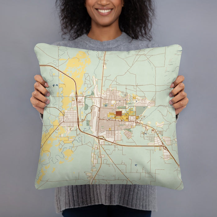 Person holding 18x18 Custom Laramie Wyoming Map Throw Pillow in Woodblock