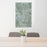 24x36 Laredo Texas Map Print Portrait Orientation in Afternoon Style Behind 2 Chairs Table and Potted Plant