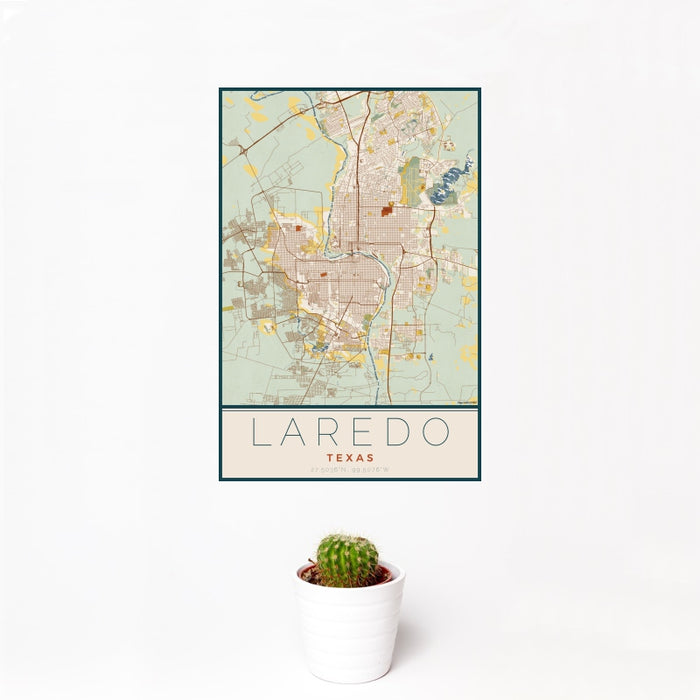 12x18 Laredo Texas Map Print Portrait Orientation in Woodblock Style With Small Cactus Plant in White Planter