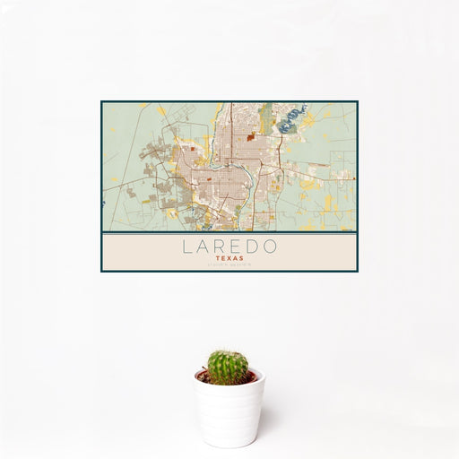 12x18 Laredo Texas Map Print Landscape Orientation in Woodblock Style With Small Cactus Plant in White Planter