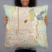 Person holding 22x22 Custom Laredo Texas Map Throw Pillow in Woodblock