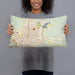 Person holding 20x12 Custom Laredo Texas Map Throw Pillow in Woodblock